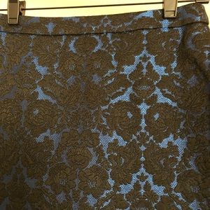 Blue mini skirt with black roses